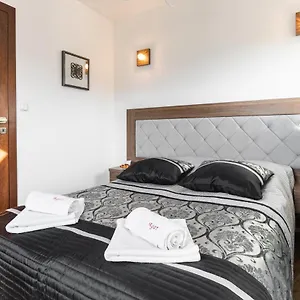aparthost-rezydencja-sienkiewicza.zakopanehotels.org/